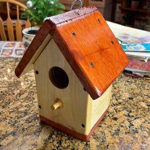 Handmade rustic birdhouse with 3 coats of marine grade varnish.